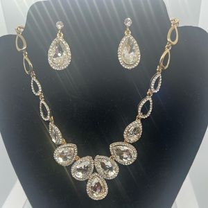 Necklace and earrings.